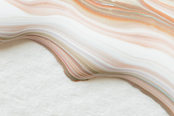 Obraz premium Mixed orange fluid paint