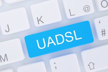 UADSL. Computer Tastatur von oben zeigt Taste mit Wort hervorgehoben. Software, Internet, Programm