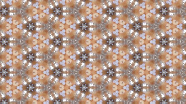 abstract kaleidoscope background with glitter of precious stones.