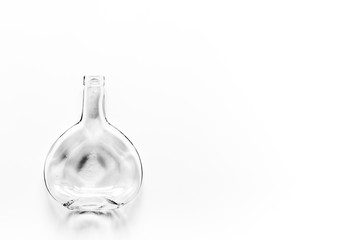 Empty bottle on white background top view copy space