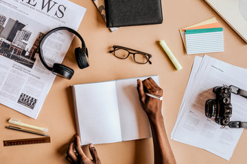 Man writing in a notebook