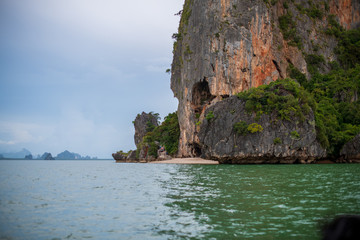 Beautiful landscape of limestone islands and emerald color water in Phang-Nga bay national park near Phuuket Thailand.