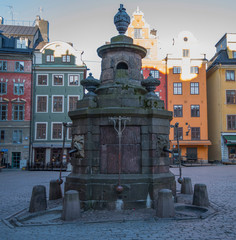 Fototapeta premium Morning view over the empty square Stor Torget in the old town district Gamla Stan in Stockholm at the corona shut down 