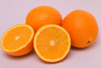 Fresh and tasty oranges with white background
