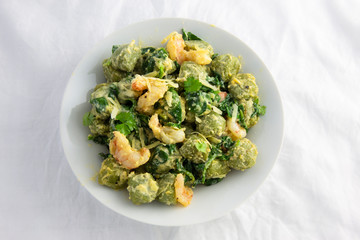 Creamy cheesy sauce spinach gnocchi with shrimp