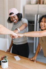 Diverse team celebrate success with fist bump