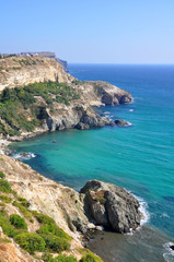 The rocky shore of the island
