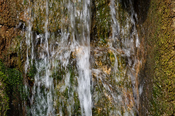 View to mini waterfall in park