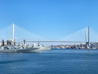 Vladivostok. Golden bridge-cable-stayed bridge over the Golden horn Bay in spring in sunny weather