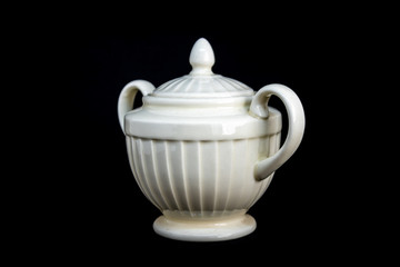  pot ceramic on black background.