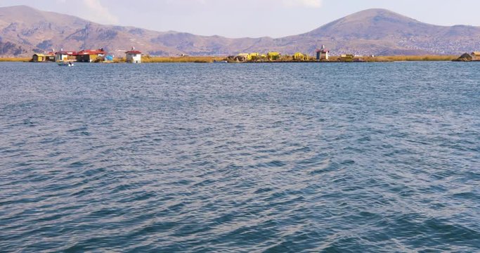 Peru navigation on Titicaca lake watching floating island