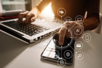 Businesswoman hand working digital marketing media in virtual screen with mobile phone and modern...