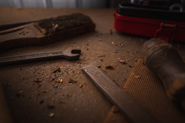 Closeup of hand tools on work bench
