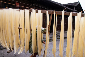 Noodles on a wooden frame