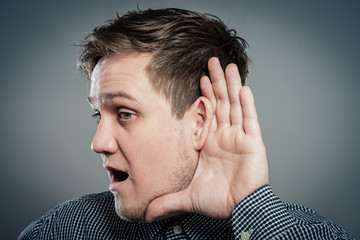 young man which overhears conversation