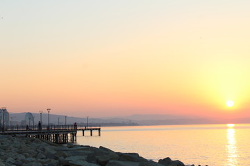 sunset over the pier