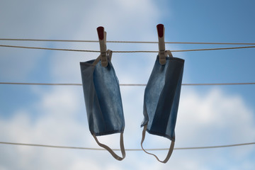 Reuse of medical face mask due to the lack of masks.