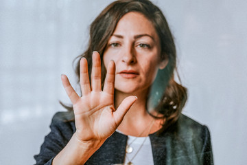 Woman using a transparent wall