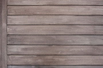 Dark brown wood texture with natural striped pattern background