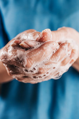 Thorough hand washing with soap - thick soapy foam on the skin - disinfection at home
