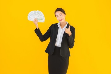 Beautiful portrait young asian woman with a lot of monet cash