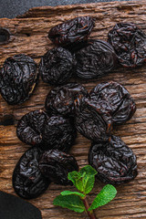 prunes, dried plums (tasty and healthy fruits) desiccated keto or paleo diet
menu concept. background. top view. copy space for text