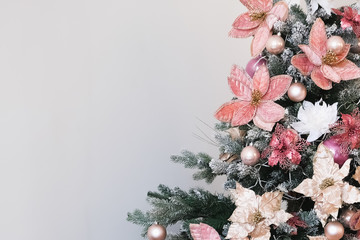 Christmas toys and white balls on a Christmas tree