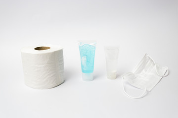 Coronavirus corona virus prevention travel surgical masks, hand sanitizer gel and tissue for hand hygiene spread protection.