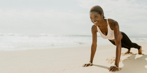 Beautiful woman planking