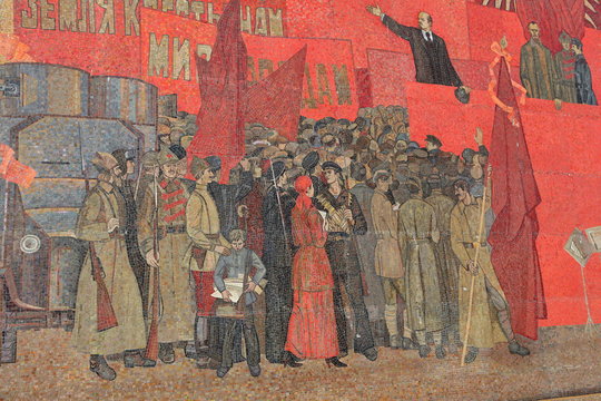 Ancient Soviet mosaic on building facade in Barnaul city, Russian Federation, Russia. Lenin (Vladimir Ulyanov) portrait. Exterior of house. Barnaul architecture landmark, architectural monument