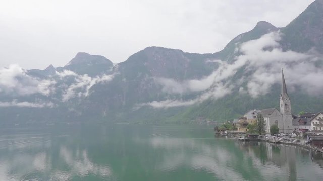 halstatt lake reflect cloud and mountain