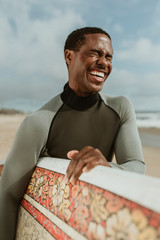 Smiling male surfer