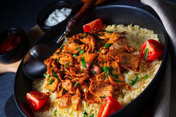 rustic bulgur pans with gratinated gyros and yoghurt