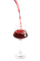 pouring red wine in glass isoalted on white background