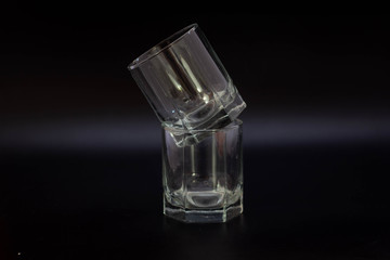 clear glasses for water on a black background