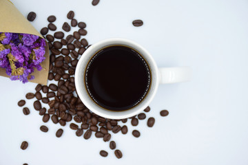 Obraz na płótnie Canvas top view of coffee cup on white background