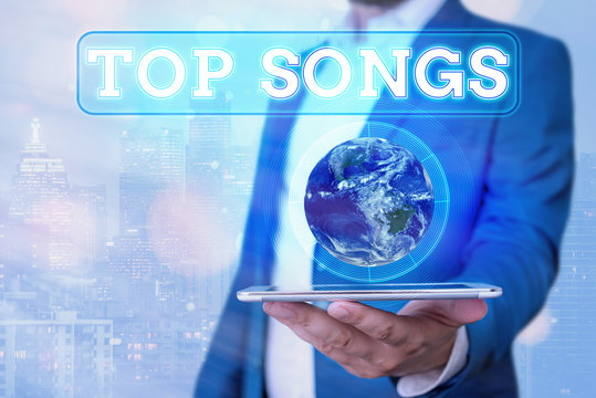 Text sign showing Top Songs. Business photo showcasing recorded song that becomes broadly popular or wellknown Elements of this image furnished by NASA - Powered by Adobe
