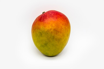 Mango fruit isolated on white background. One ripe mango fruit isolated. Healthy one whole fresh big ripe red mango fruit for the diet meal