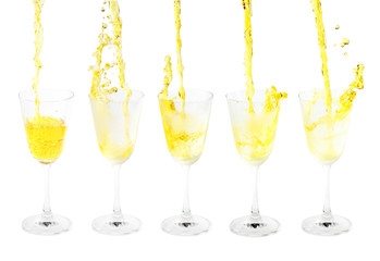 pouring cocktail with splashes isoalted on white background