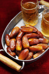 Dates fruit on carpet background, Islamic background in mosque