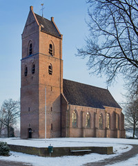 Fototapeta na wymiar Winter. Snow. Church Vledder Drenthe Netherlands