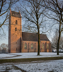 Fototapeta na wymiar Winter. Snow. Church Vledder Drenthe Netherlands