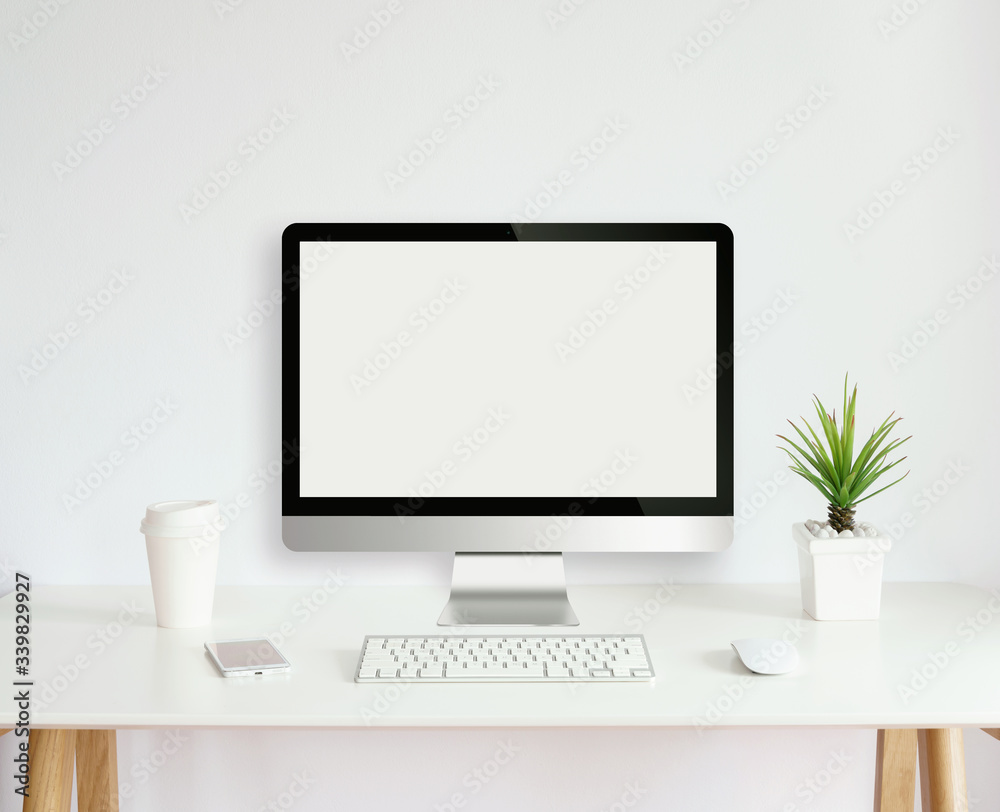 Wall mural modern computer monitor template mock up on white work desk with blank screen