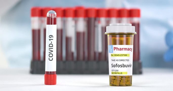 Lab tube with COVID-19 test and prescription bottle with sofosbuvir generic pills on the table