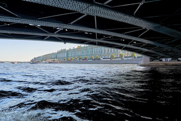 View of the embankment from under the bridge. Russia Saint Peter
