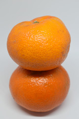 Orange tangerine with peel photographed on a white background,fruits and vitamin c