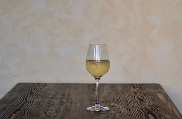 relax with a fresh delicious glass german riesling white wine on a table