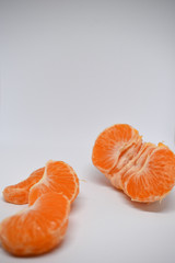 Peeled orange tangerine, white background, fruit, vitamin c