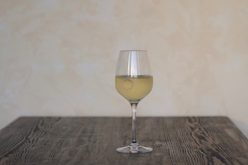 relax with a fresh delicious glass german riesling white wine on a table