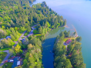 Olympic Penninsula aerial photos of the Puget Sound and land with houses near Olympia, WA.